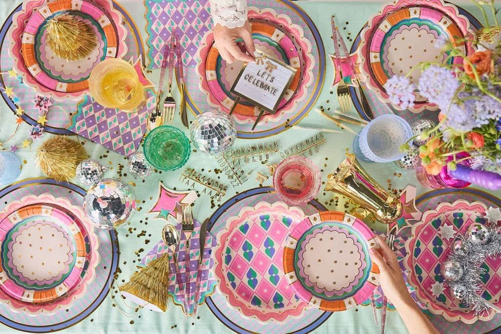 Set of 10 Welcome To The Circus placemats by Packed Party, 15-inch round fabric placemats with colorful circus-themed design.