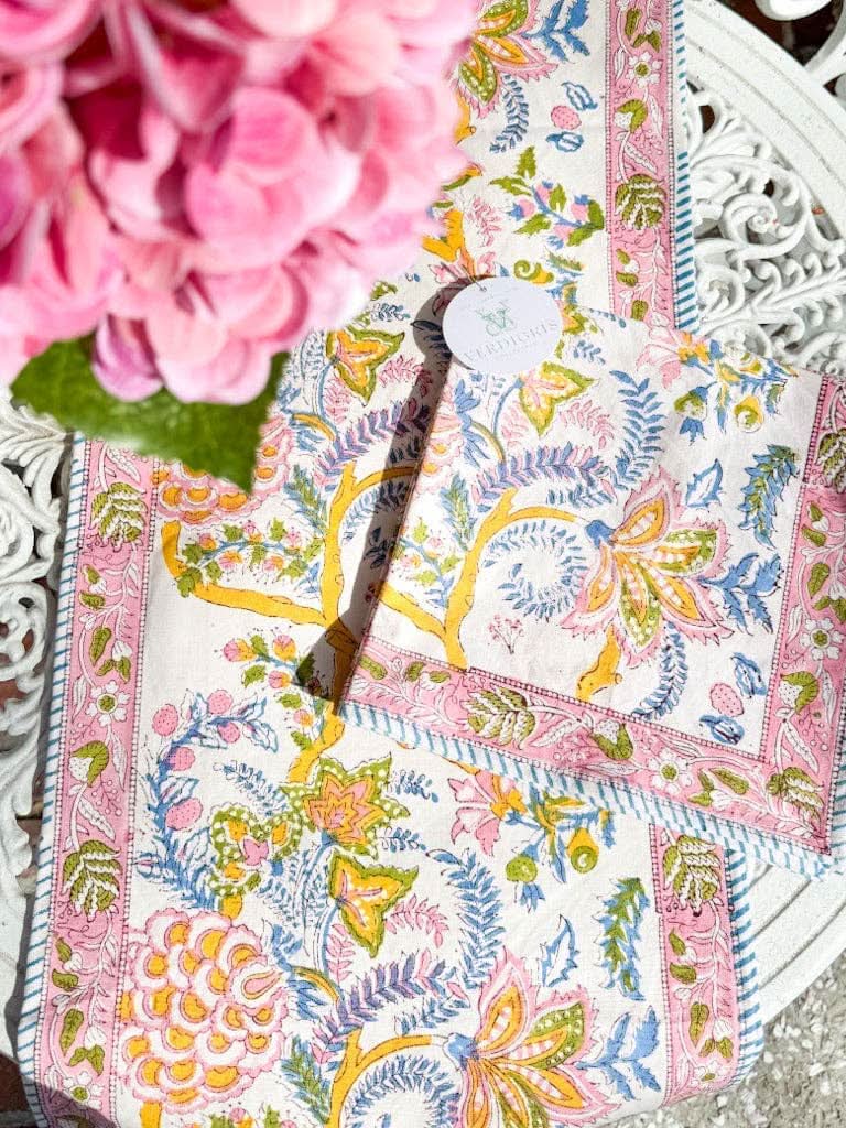 Set of four Drayton napkins from the Verdigris Collection with intricate botanical patterns on soft fabric.