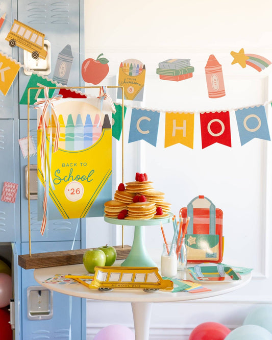 Set of 8 9-inch alphabet plates by My Mind’s Eye with colorful letter designs for party or table setting.