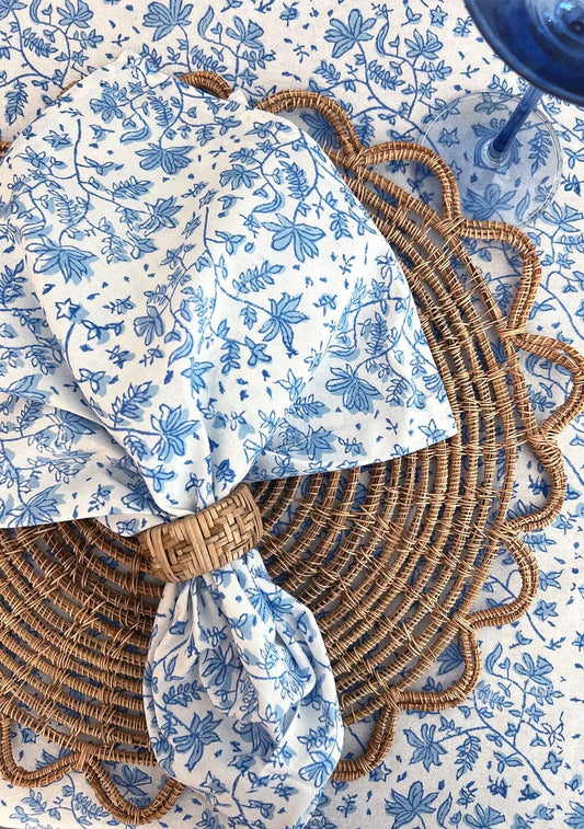 Set of 4 Whimsy Floral Napkins in Sorrento Blue by Christina Dickson Home, featuring vibrant floral patterns on fabric.