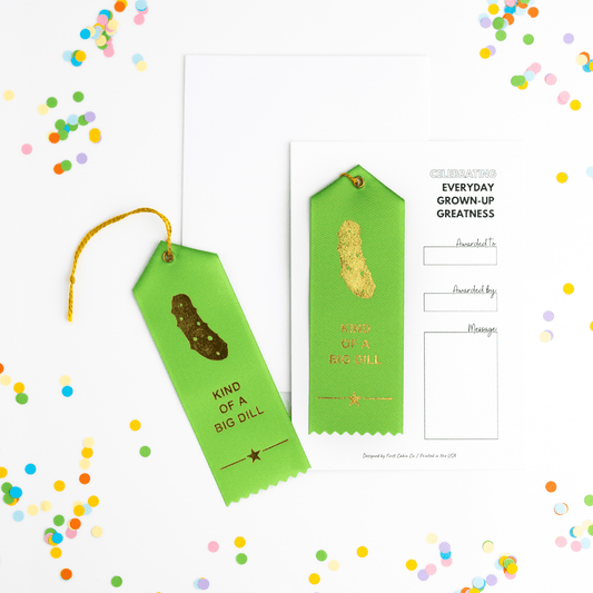 First Cabin Co. Kind of a Big Dill Award Ribbon with gold and green colors, featuring a decorative design and text for celebration.