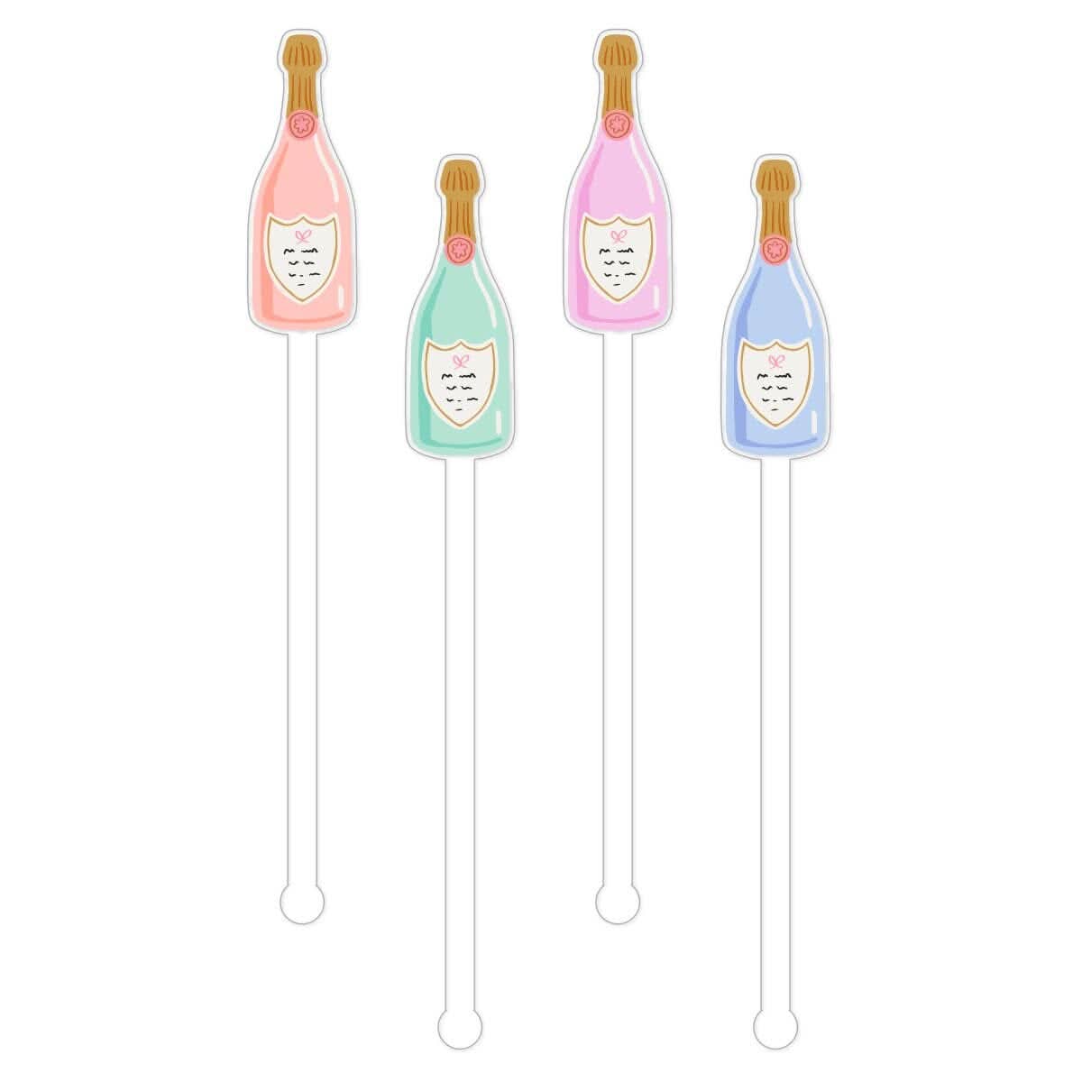 Set of four champagne bottle-shaped stir sticks from soiree-sisters for cocktail garnishing and stirring.