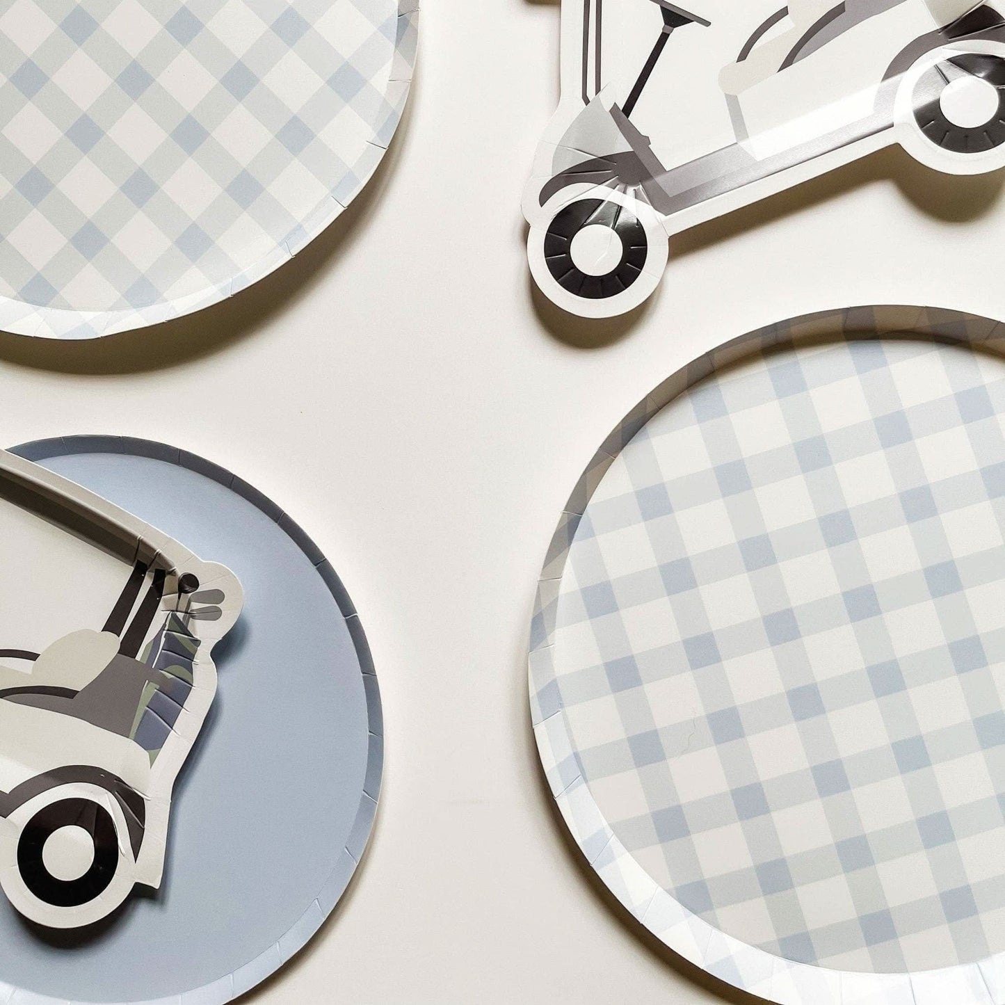 Set of 12 premium baby blue plaid plates by Josi James, featuring a stylish pattern and smooth surface for serving food.