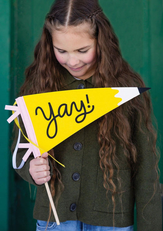 Yay Pencil Felt Pennant by My Mind’s Eye featuring a cheerful yellow pencil design on a felt banner.