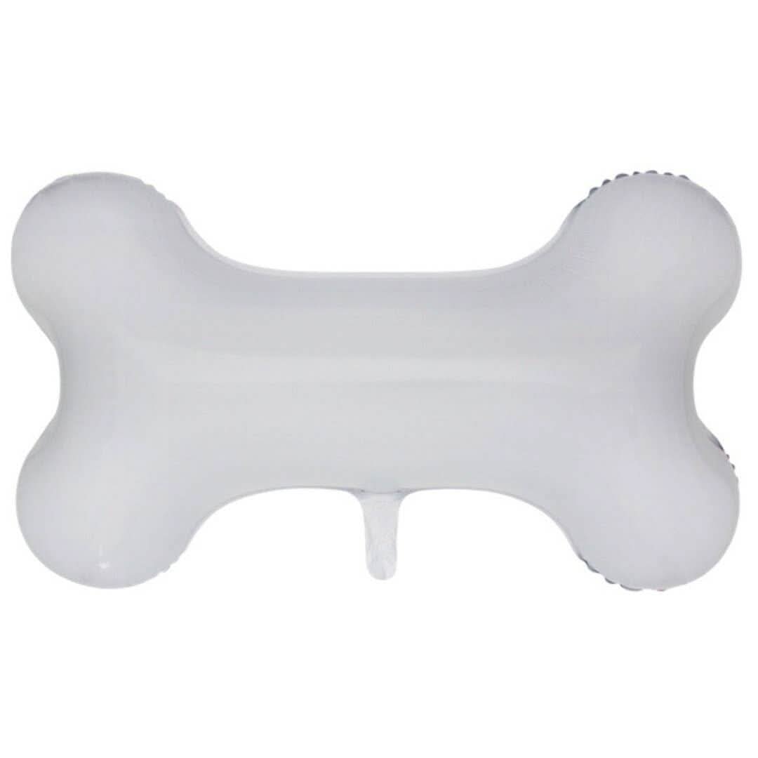 Large white dog bone-shaped Mylar balloon, 29 inches, from Ellie's Party Supply, with shiny surface and bold bone design.