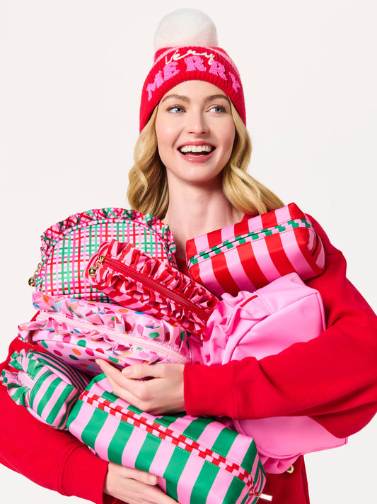 Shiraleah Holly Stripe Pink Cosmetic Pouch with zipper closure and fabric pattern, ideal for makeup and small accessories.