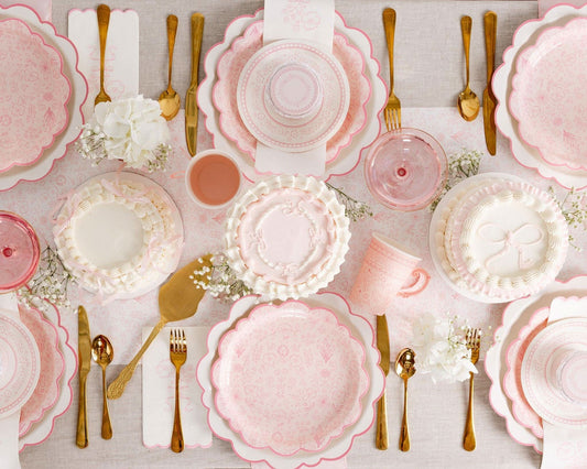 My Mind’s Eye Pembroke table runner with floral and geometric patterns in soft pastel colors on a wooden table.