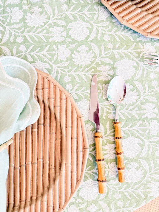 Verdigreen tablecloth from Verdigris Collection with intricate green and gold floral pattern on smooth fabric.
