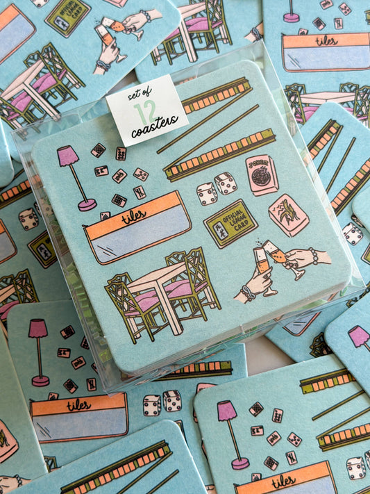 Set of 12 Thirteenwinks Mahjong Essentials disposable coasters featuring traditional Mahjong tile designs.