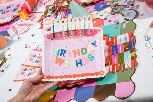 Set of 10 Make A Wish Cake Dessert Plates by Packed Party, 8-inch paper plates with colorful wish-themed design.