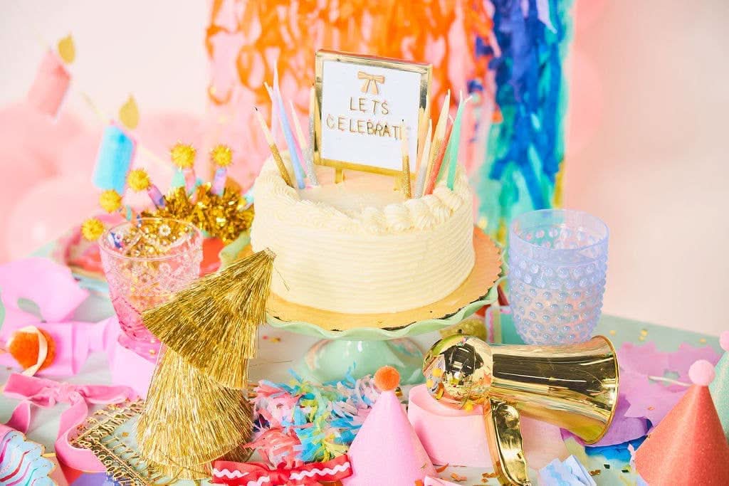 Packed Party letterboard cake topper with customizable wooden letters for birthday and celebration cakes.