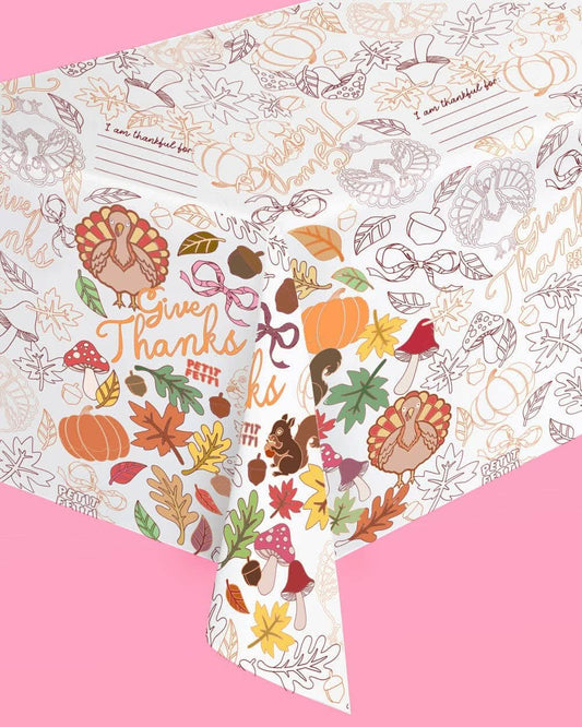 Give Thanks paper tablecloth by xo, Fetti featuring fall-themed autumn leaves and harvest motifs for festive table settings.