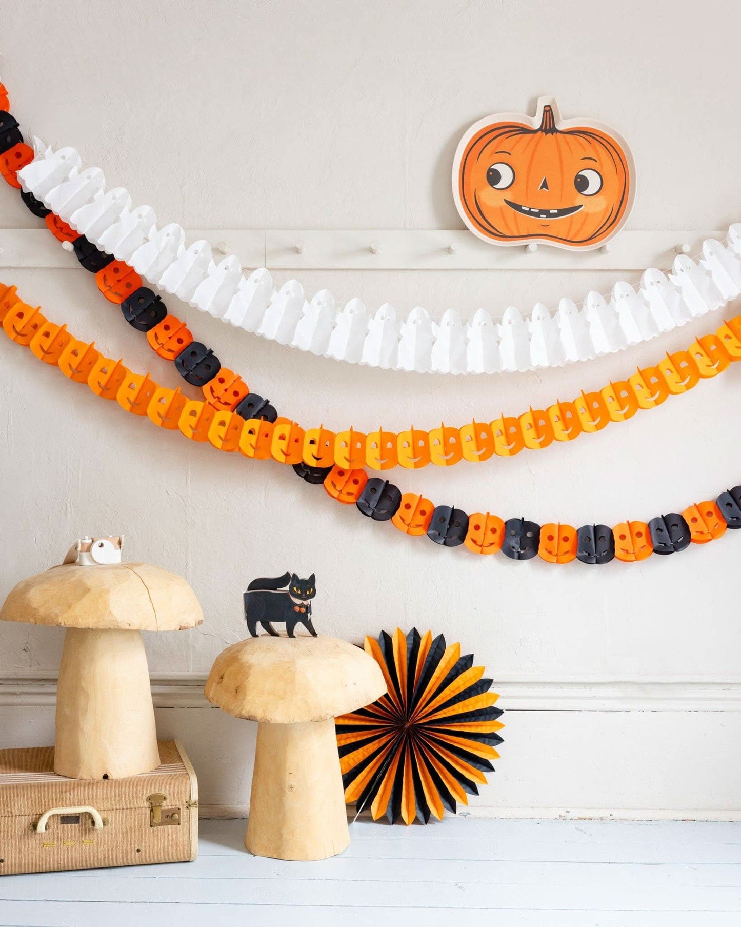 Halloween tissue garland by My Mind’s Eye featuring festive orange and black tissue paper streamers for spooky decorations