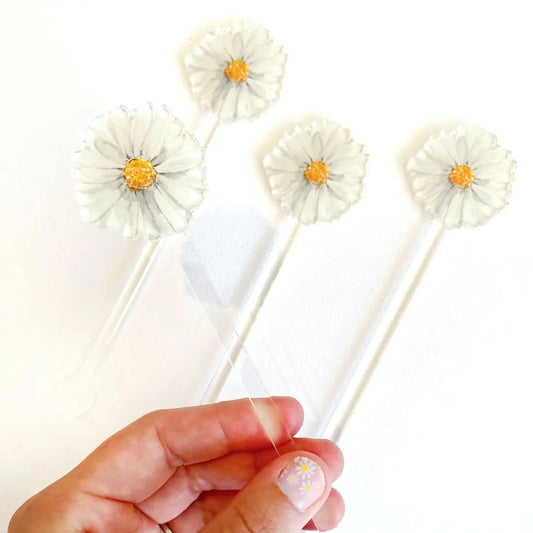 Set of two Daisy acrylic stir sticks by Cami Monet featuring colorful daisy flower designs for beverage mixing.
