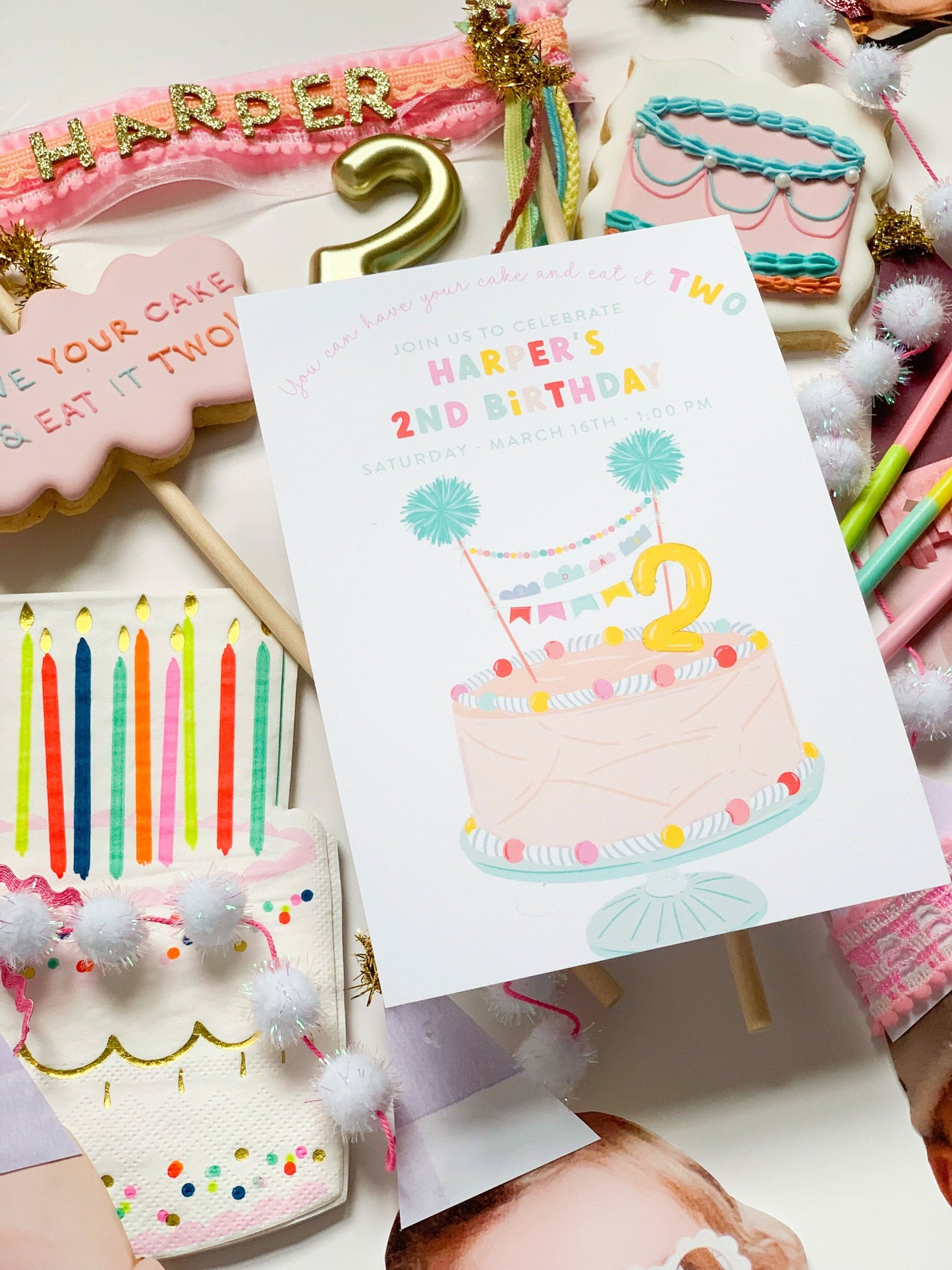 Invitation card for "Have Your Cake and Eat It Twice" by Porcupine Paper Co., featuring colorful cake illustrations and elegant design.