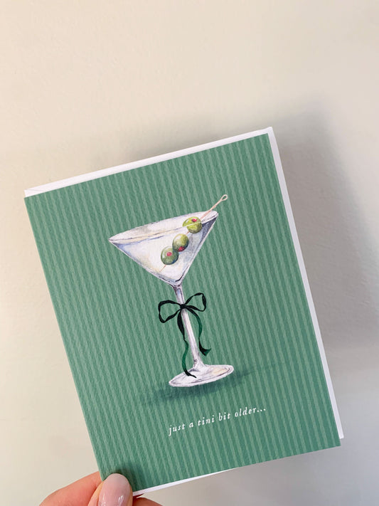 Cami Monet Just a Tini Bit Older birthday greeting card featuring colorful floral design and modern typography.