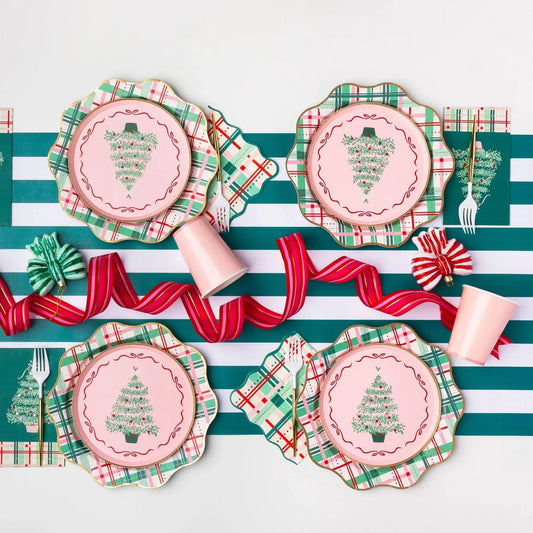 Set of 20 large Christmas plaid napkins by Bonjour FĂȘte featuring festive red and green checkered fabric for holiday table decor.