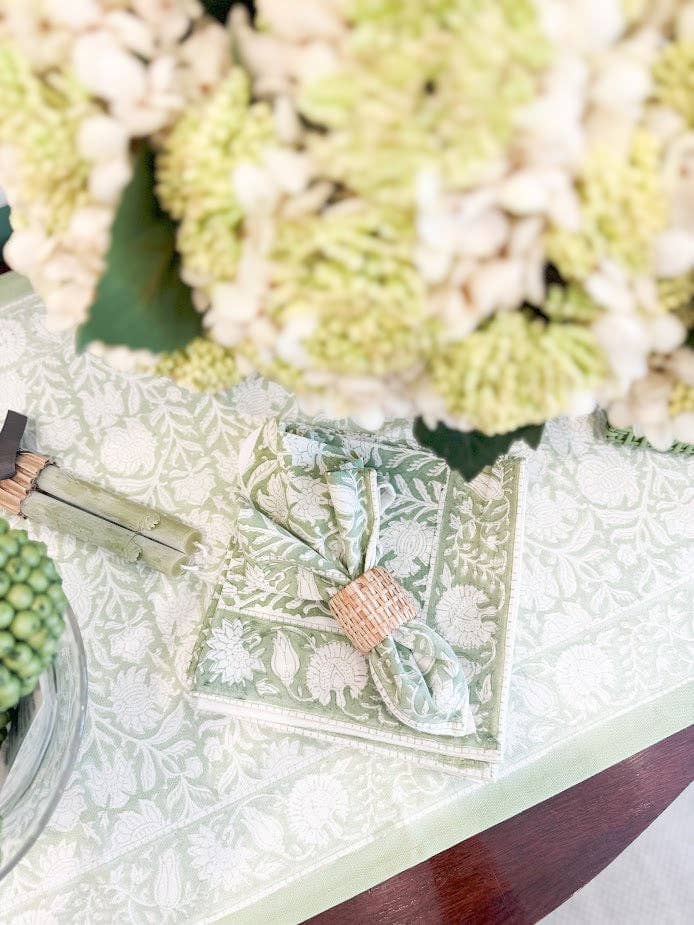Set of four Verdigris Collection Verdigreen napkins with a vibrant green color and elegant fabric texture.
