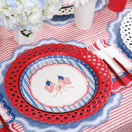 Red Basketweave Dinner Paper Plates from Gatherings by Curated Paperie with a textured basketweave design for serving meals.