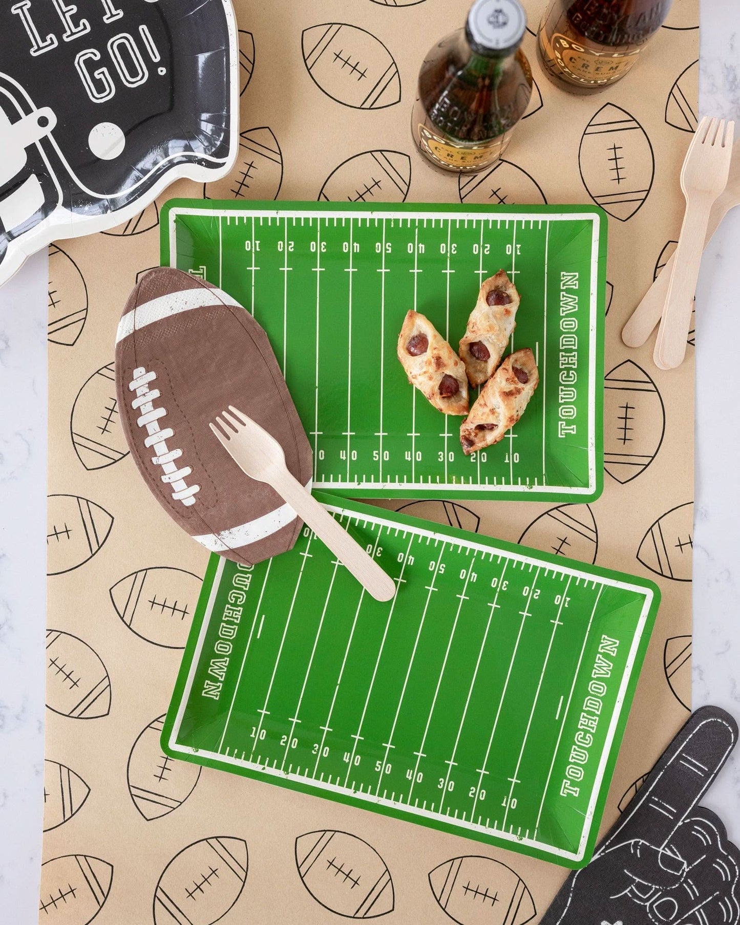 Football Kraft table runner by My Mind’s Eye, 16" x 120", featuring a rustic kraft paper design with football-themed accents.