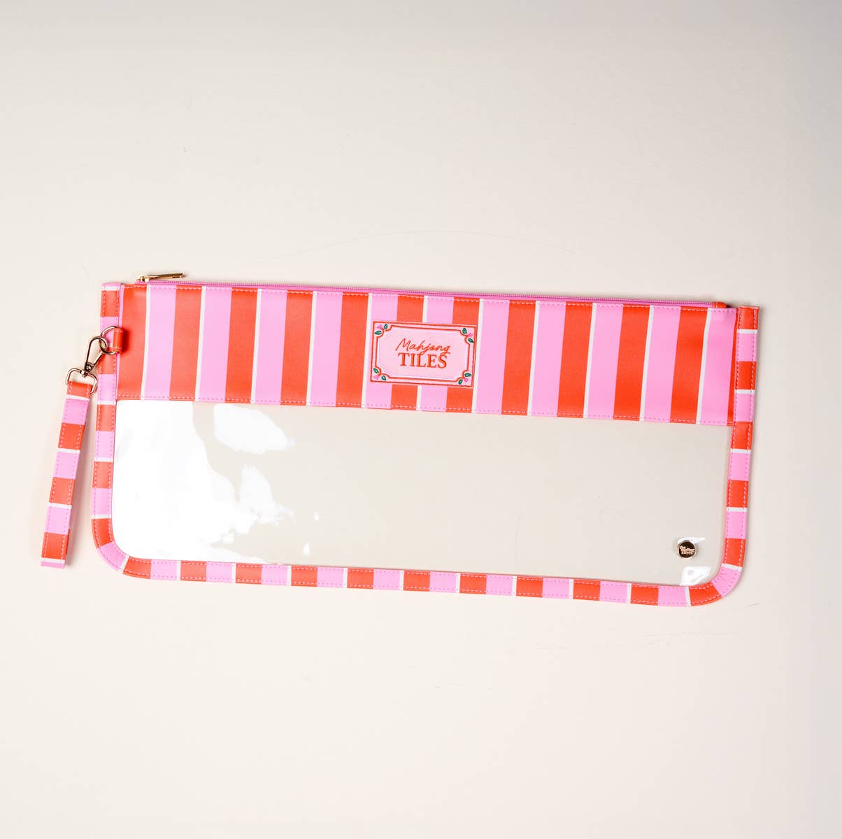 Mahjong tile keeper pouch by The Darling Effect with pink Sicily stripes, featuring a compact, fabric storage case for game tiles.
