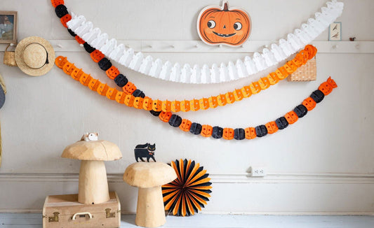 Halloween tissue garland by My Mind’s Eye featuring orange and black paper tissue decorations for festive Halloween decor.