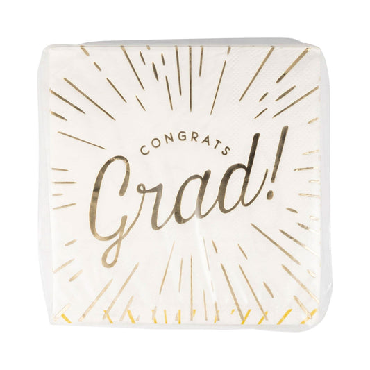 Foiled Congrats Grad cocktail napkin by My Mind’s Eye featuring a celebratory design with gold accents and "Congrats Grad" text.