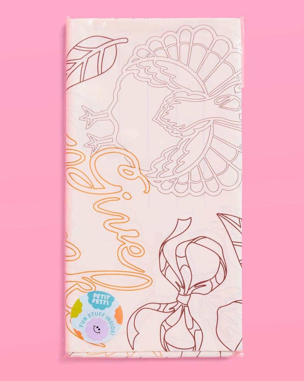 Give Thanks paper tablecloth by xo, Fetti featuring a festive design for Thanksgiving celebrations, laid out on a table.