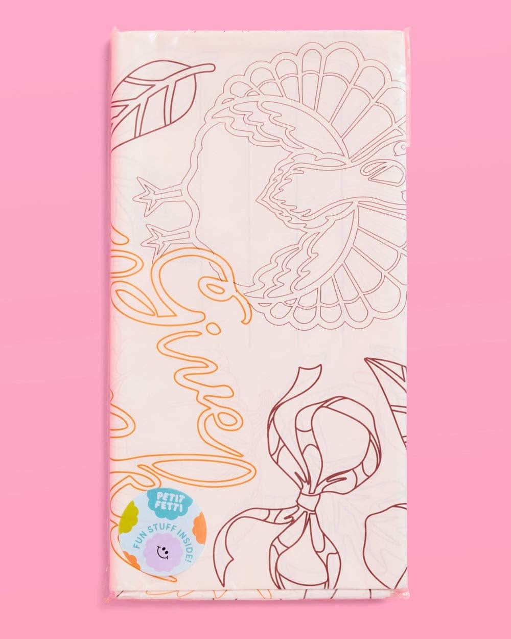 Give Thanks paper tablecloth by xo, Fetti featuring a festive design for Thanksgiving celebrations, laid out on a table.