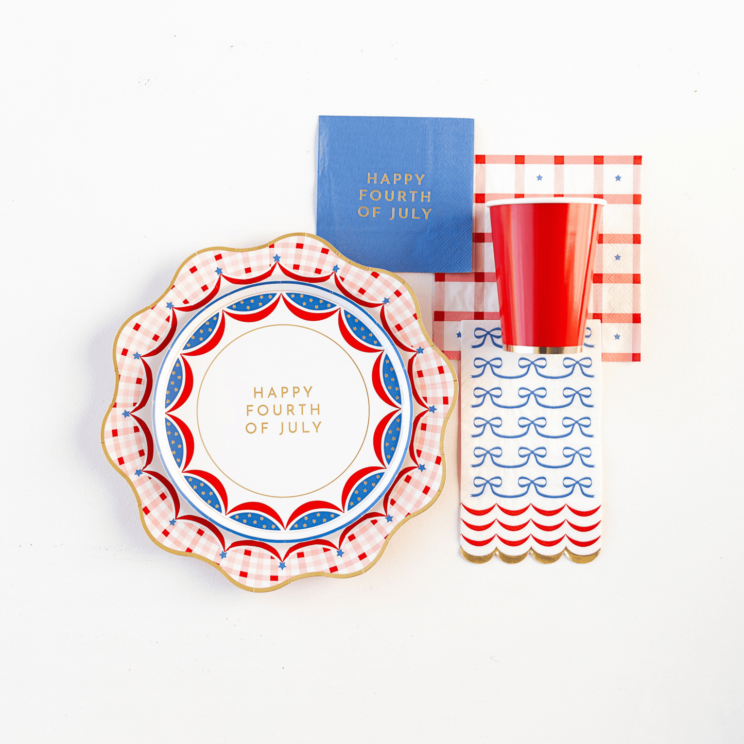 Red gingham 4th of July large napkins by Bonjour FĂȘte, pack of 20, showing festive table linens with bold red and white checks.