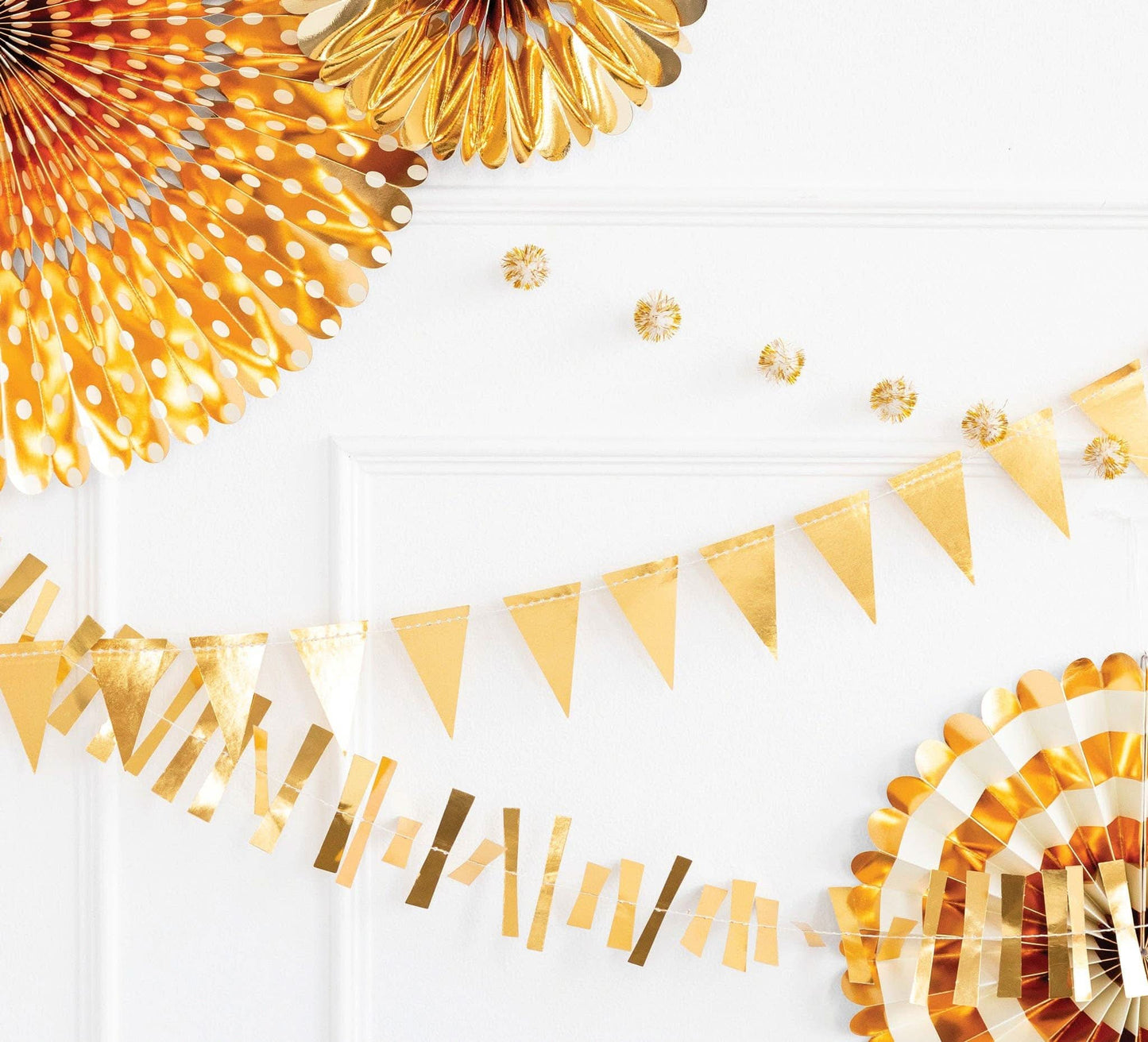 Gold mini banner set by My Mind’s Eye featuring small, shimmering banners for decorative craft or party projects.