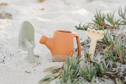 Marlowe & Co terracotta silicone garden set with small watering can, trowel, and seedling pots for outdoor gardening tools