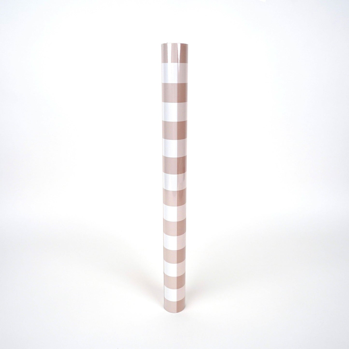Brown gingham paper table runner from Gatherings by Curated Paperie, with a classic checkered design on a table setting.