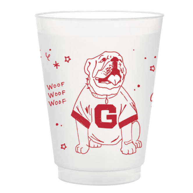 White cup with red dog illustration and 'Woof Woof' text on a white background