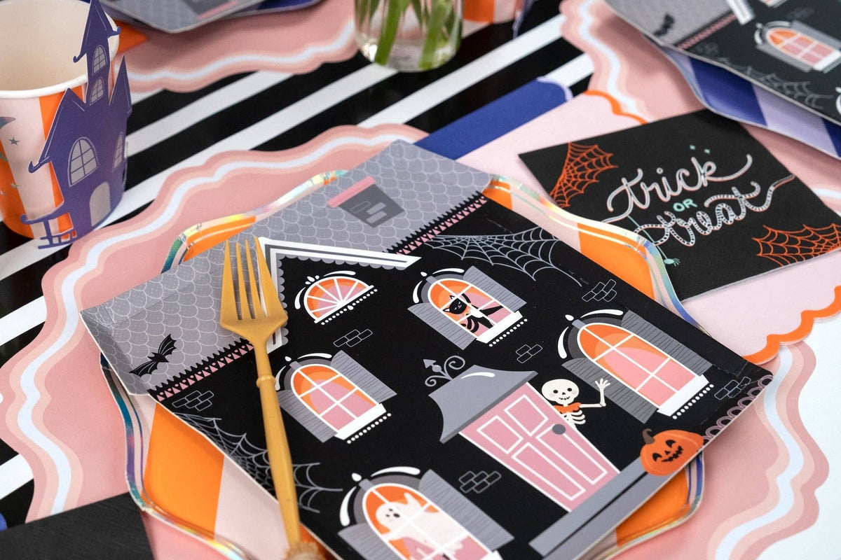 Haunted house Halloween shaped paper plates with spooky castle design, perfect for Halloween party tableware.