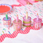Set of four mini birthday cake-themed party hats by Packed Party, colorful and festive for celebration accessories.