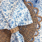 Set of 4 Whimsy Floral Napkins in Sorrento Blue by Christina Dickson Home, featuring vibrant floral patterns on fabric.