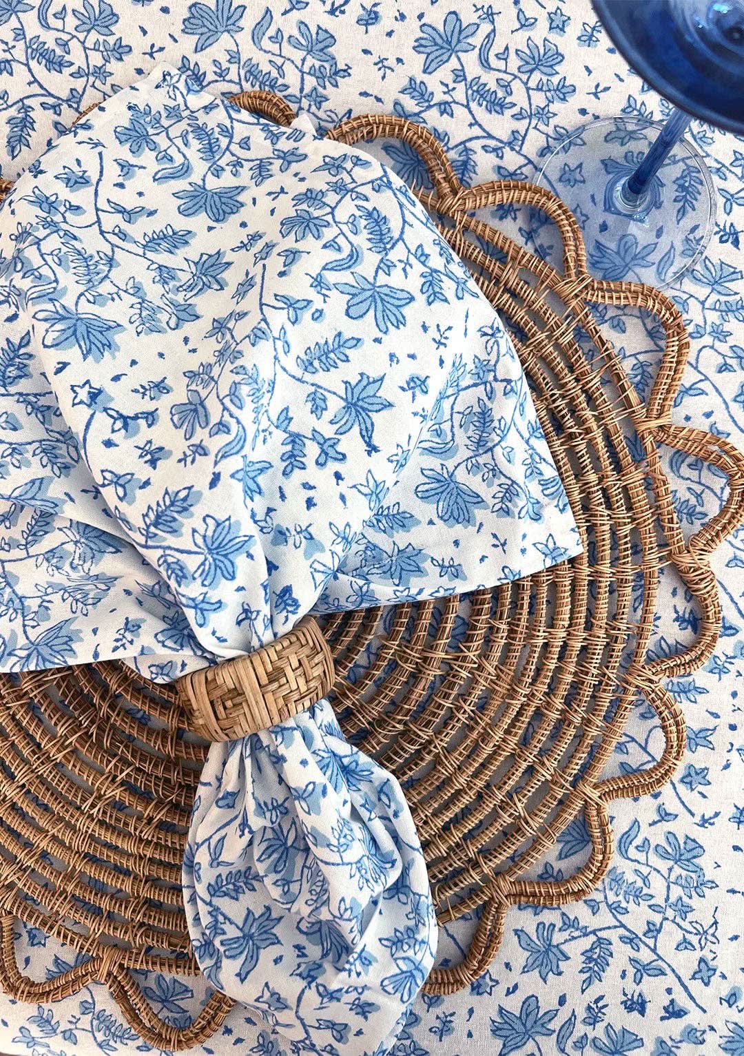 Set of 4 Whimsy Floral Napkins in Sorrento Blue by Christina Dickson Home, featuring vibrant floral patterns on fabric.