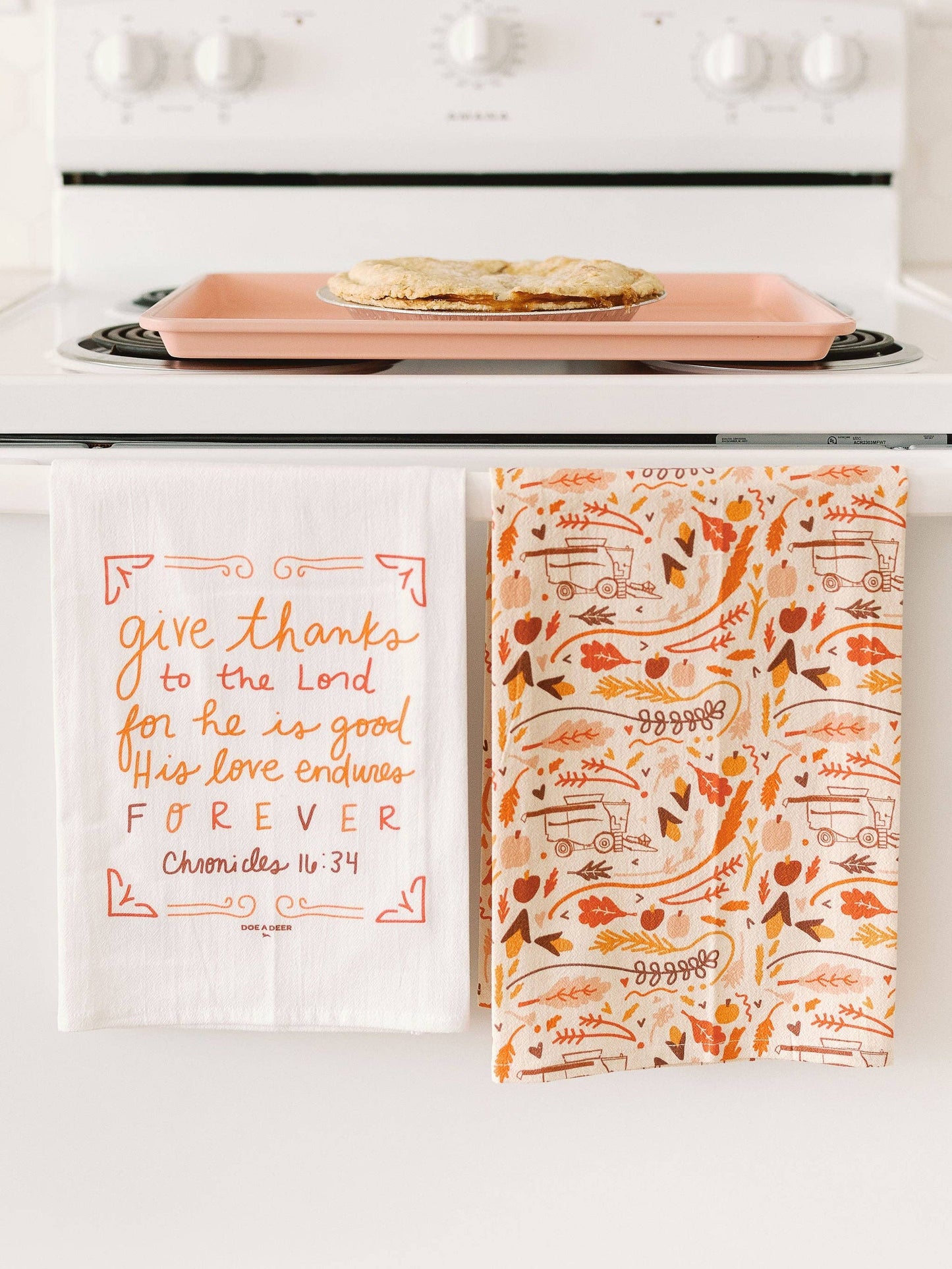 Fall-themed Flour Sack Towel with harvest and autumn patterns by Doe A Deer, featuring warm fall colors and seasonal motifs.