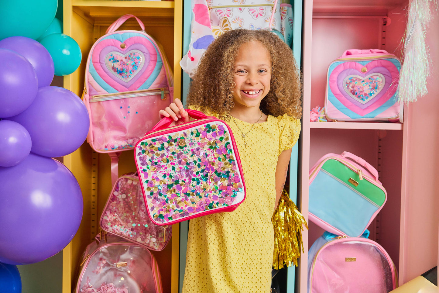 Packed Party Audrey Jewel Confetti insulated lunch box with colorful confetti design and insulated interior for food storage.