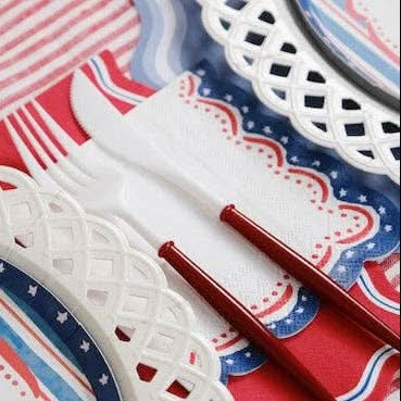 Patriotic 4th of July cocktail napkin with red, white, and blue stars and stripes from Gatherings by Curated Paperie.