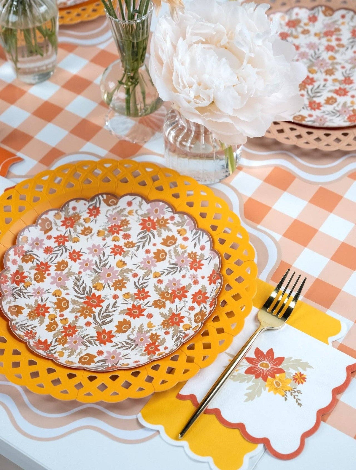Set of two autumn floral dessert plates by Gatherings by Curated Paperie with colorful fall-inspired floral designs.