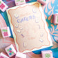 Mahjong greeting card by Thirteenwinks featuring a bird and cheerful "Cheers to You" message, perfect for celebrations and humor.