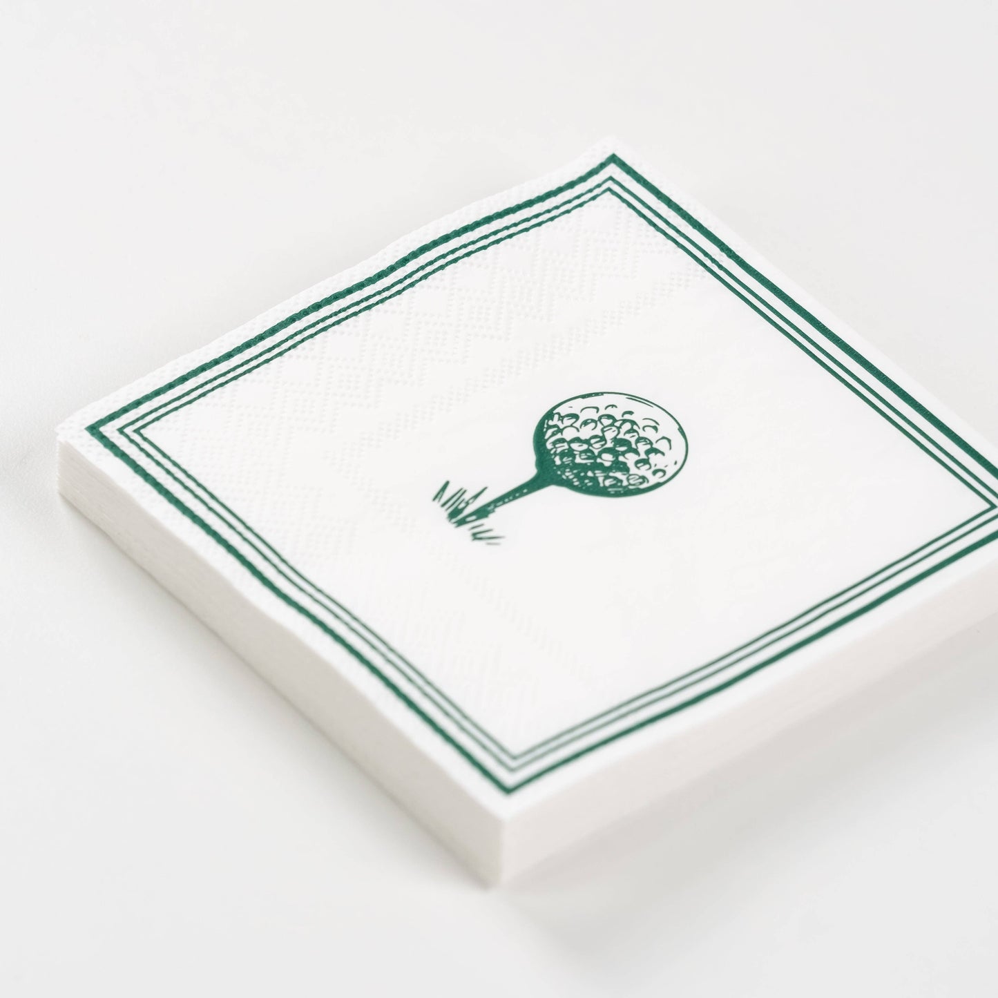 Set of three golf-themed beverage napkins from Gatherings by Curated Paperie, featuring golf ball and club designs.