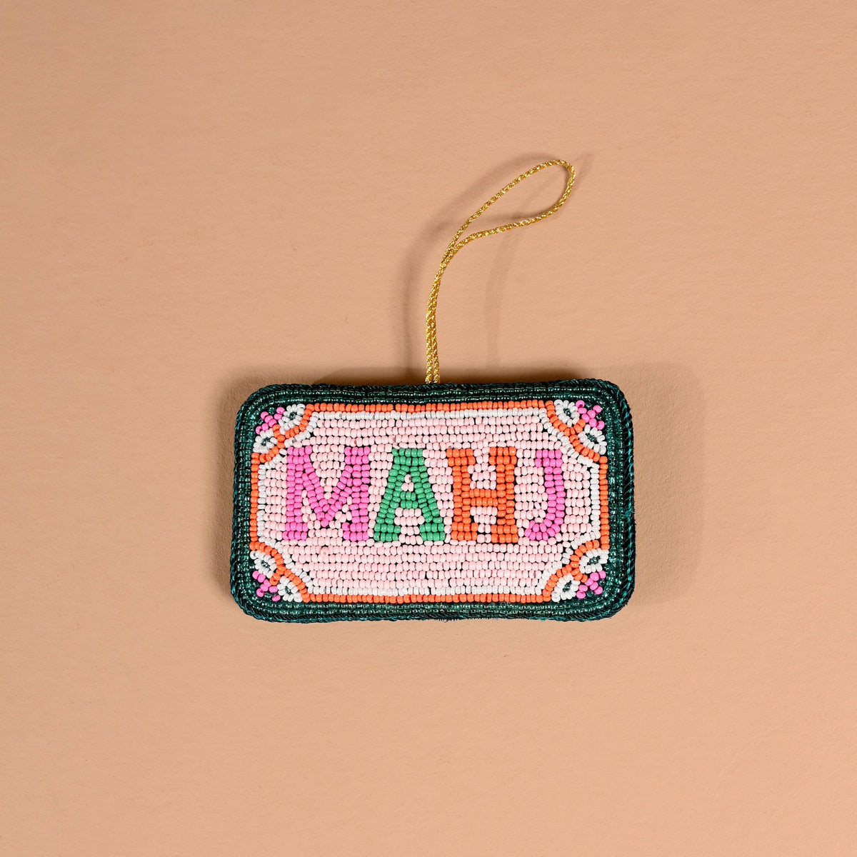 Handcrafted beaded Mahj ornament featuring colorful beads and intricate design by The Darling Effect.