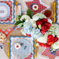 Blue Ditsy Floral Paper Plate by My Mind’s Eye featuring a delicate floral pattern on round paper dish.