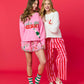 Shiraleah FA LA LA slippers in size small/medium with festive red and white Christmas design, soft plush material for cozy comfort.