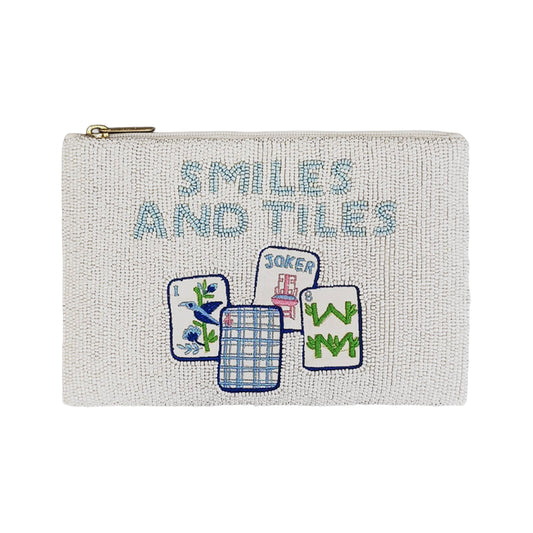 Beaded Toss Designs Smiles and Tiles beaded bag with colorful tile and smile bead details, showcasing handcrafted accessory craftsmanship.