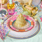Set of four Golden Girl mini gold fringe party hats by Packed Party, featuring shiny gold fabric and playful fringe details.