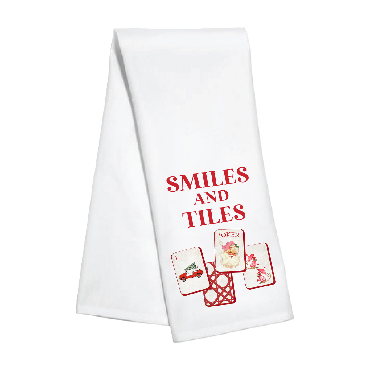 Kitchen towel featuring holiday smiles and tile patterns from Toss Designs, showcasing festive design and soft fabric.